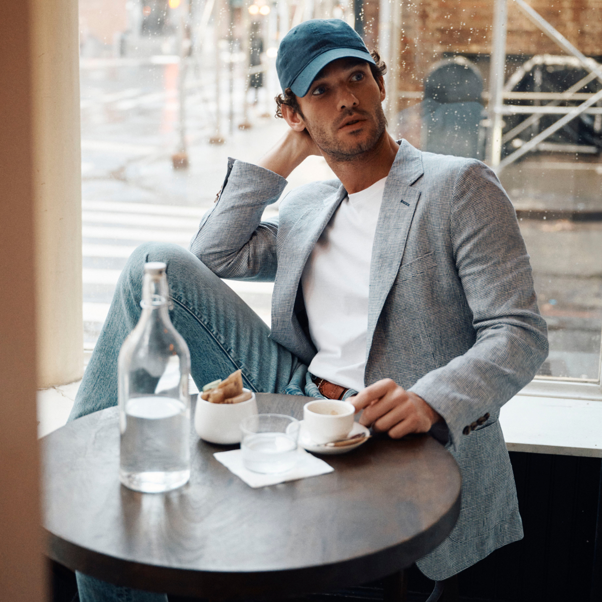 j crew picking a christmas tree loading it on back of pick up truck happy family