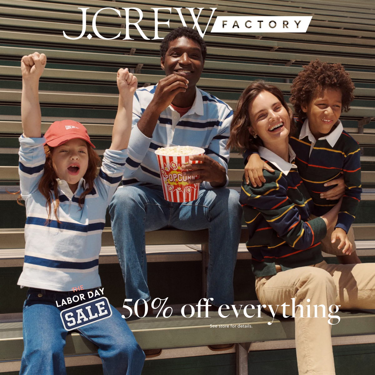 j crew picking a christmas tree loading it on back of pick up truck happy family
